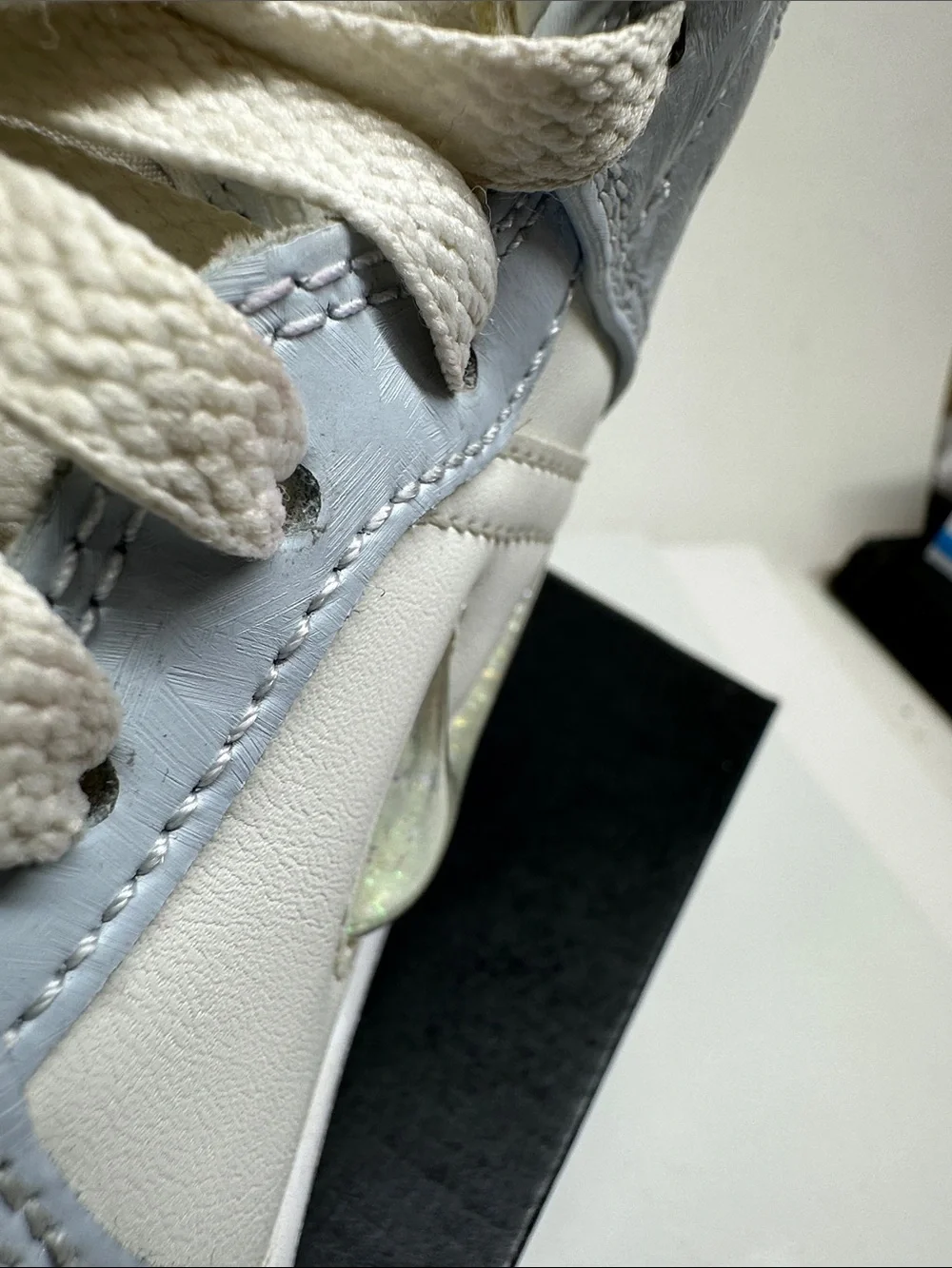 Air Jordan Kids Mid-Top Sneakers in White and Light Blue with Iridescent Swoosh